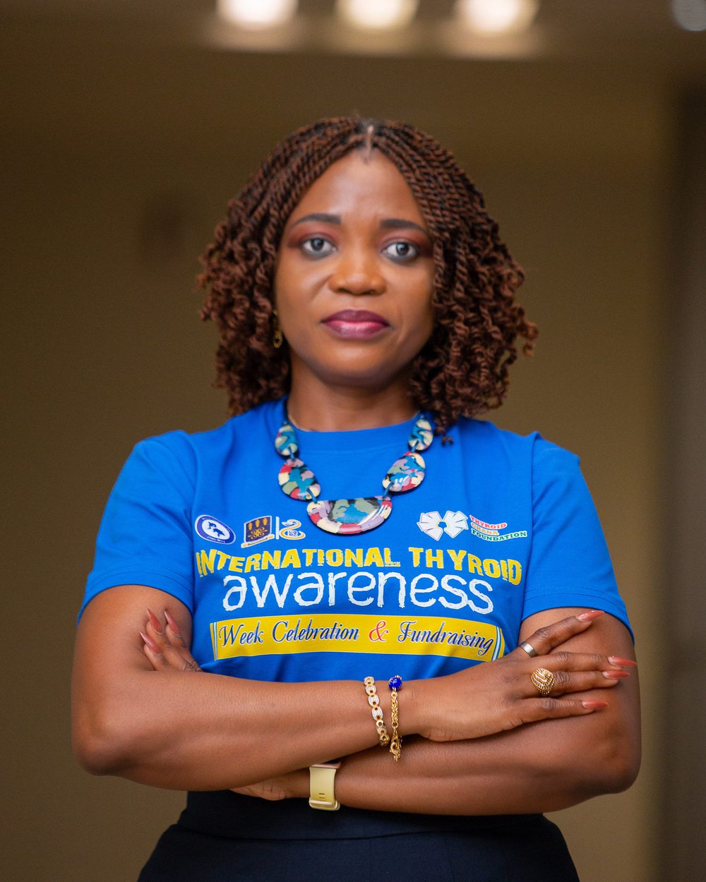 Dr. Nana Adwoa Konadu Dsane, Founder of Thyroid Ghana Foundation, in an International Thyroid Awareness Week t-shirt.