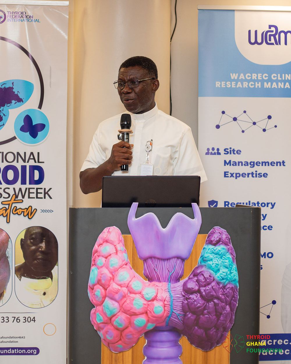 A speaker at the podium at International Thyroid Awareness Week 2026.