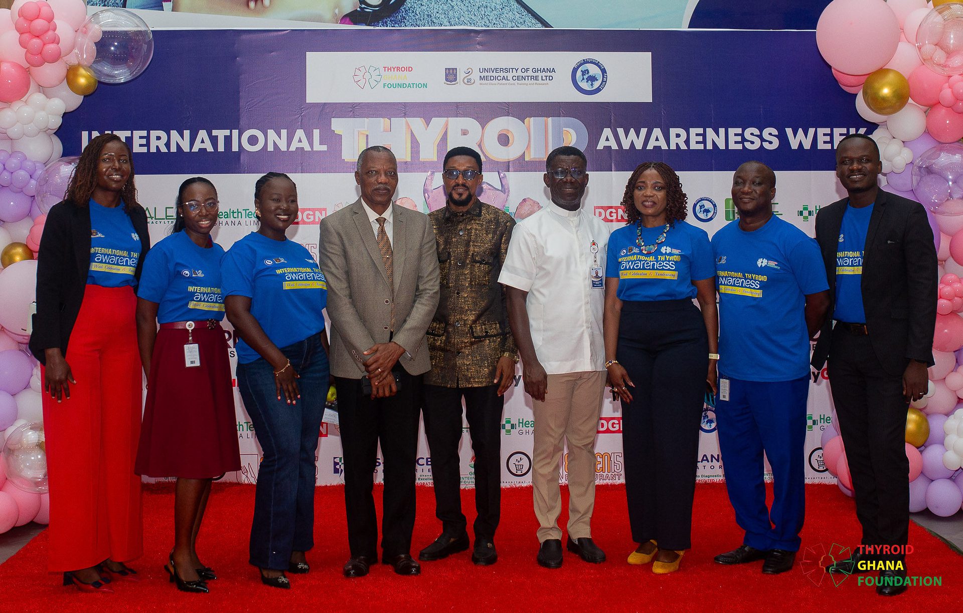 Guests and organisers of International Thyroid Awareness Week 2026 standing together in front of the event backdrop.