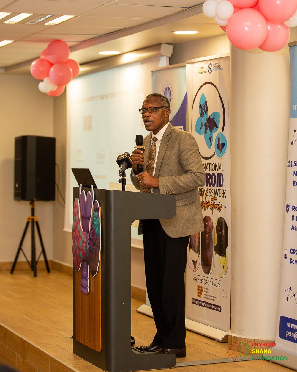 On stage at the University of Ghana Medical Centre at International Thyroid Awareness Week 2026.