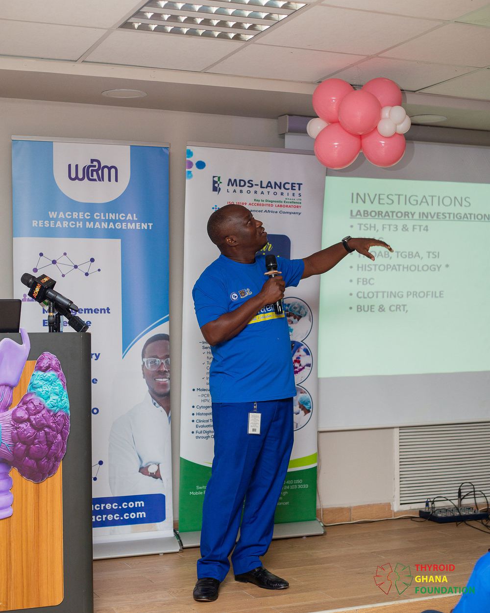 Presenting treatment options on screen at International Thyroid Awareness Week 2026.