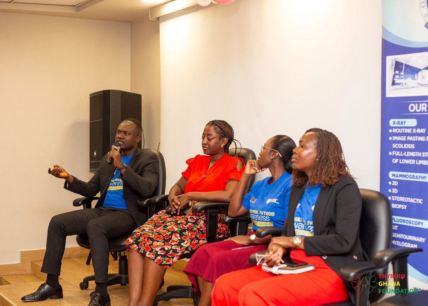 Health professionals seated on the expert panel answering questions from participants.