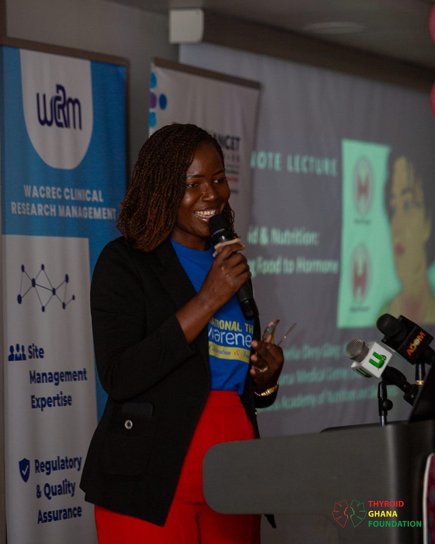 A presenter speaking at the podium during the Thyroid and Nutrition keynote.