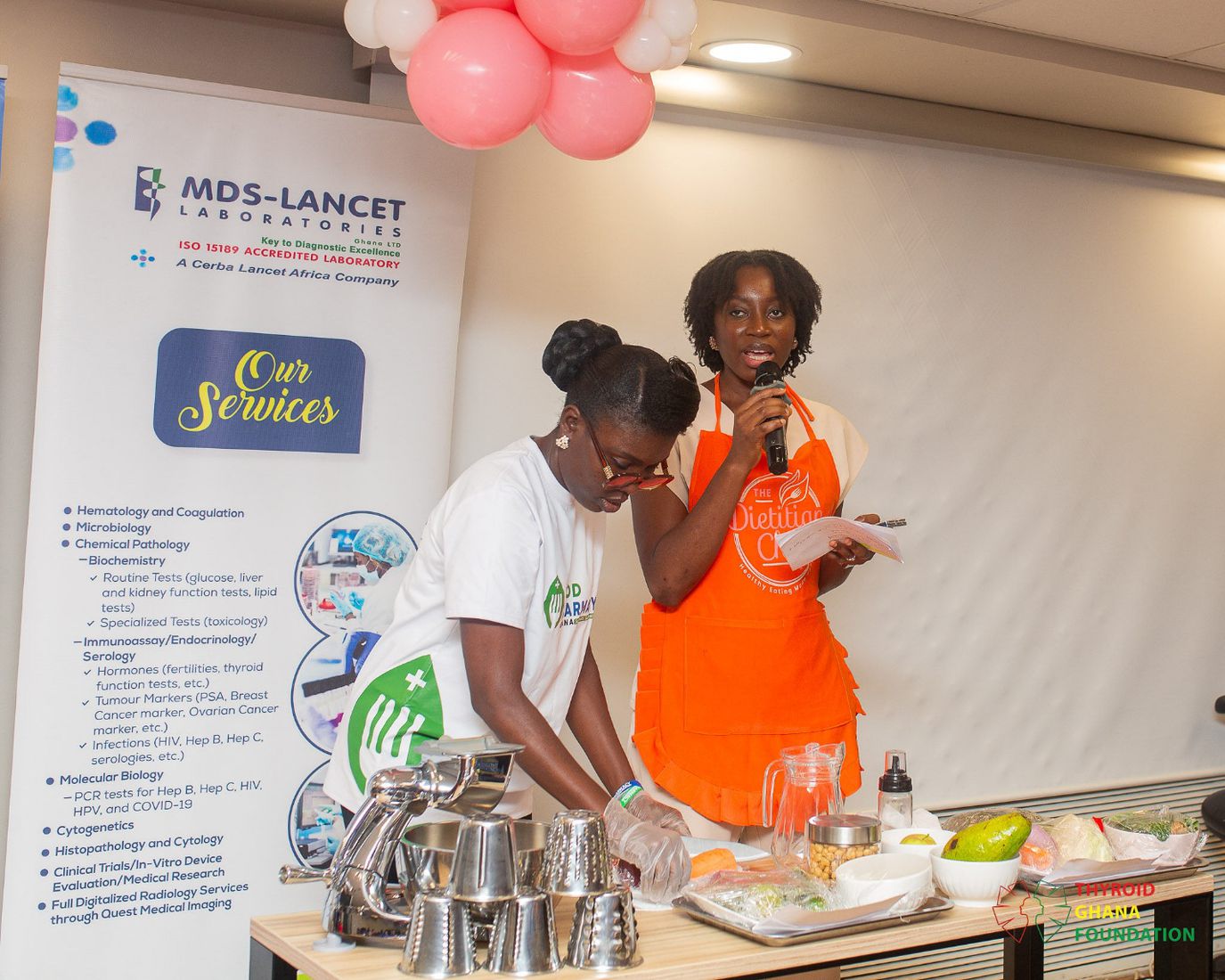 Dietitians preparing a healthy meal during the live nutrition demonstration.